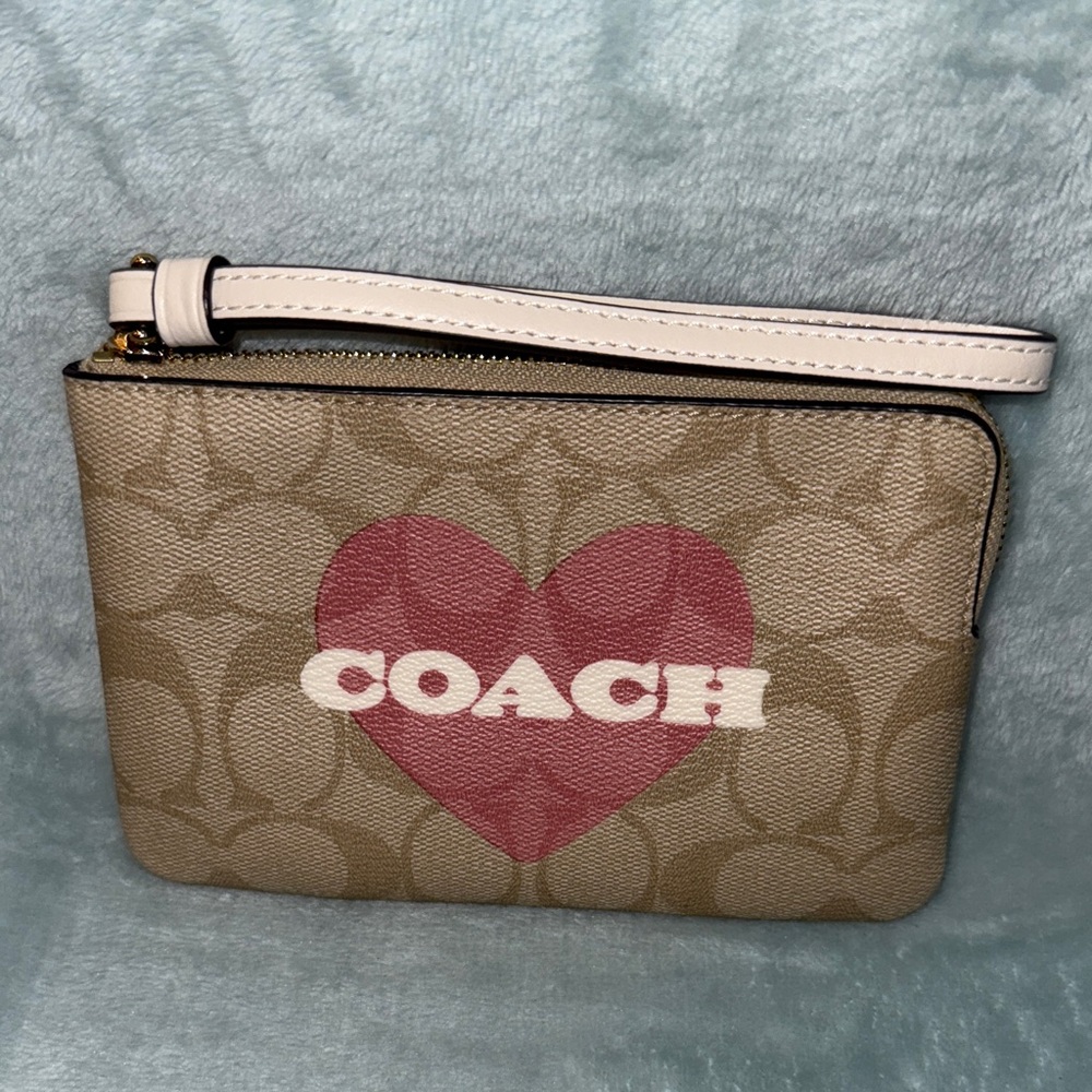 Coach Beige Wristlet with Pink Heart Accent